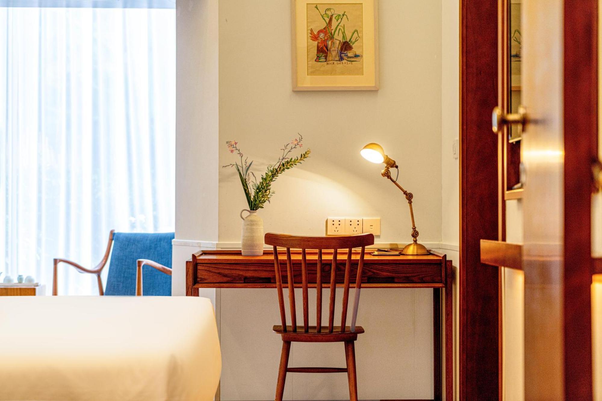 Wuyu Hotel - Chongqing University & Ciqikou Ancinet Town ภายนอก รูปภาพ